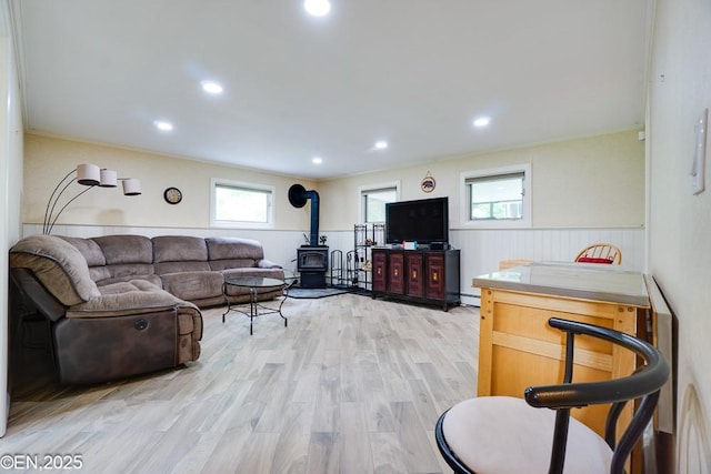 193 Washington Ave, Tappan, NY 10983 - living room with a wood stove, a wainscoted wall, plenty of natural light, light wood-style floors, and recessed lighting