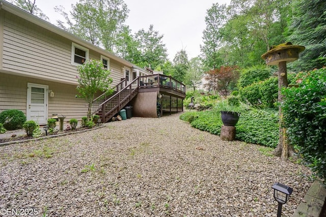 193 Washington Ave, Tappan, NY 10983 - view of yard with stairway, a deck, and gravel driveway