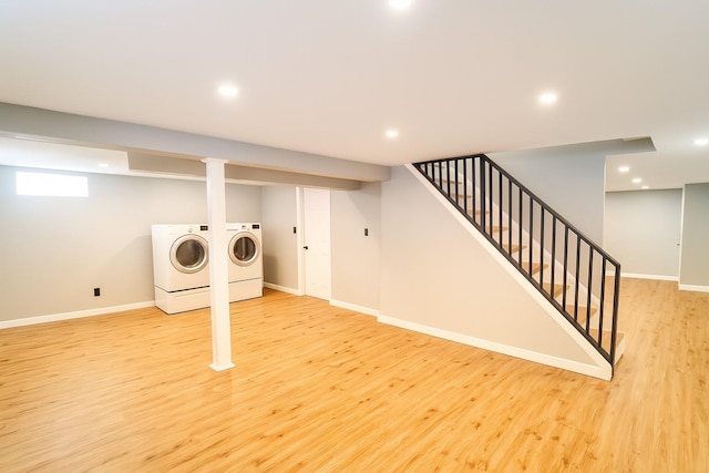 280 Neptune Ave, West Babylon, NY 11704 - below grade area featuring washer and clothes dryer, light wood finished floors, stairway, and recessed lighting
