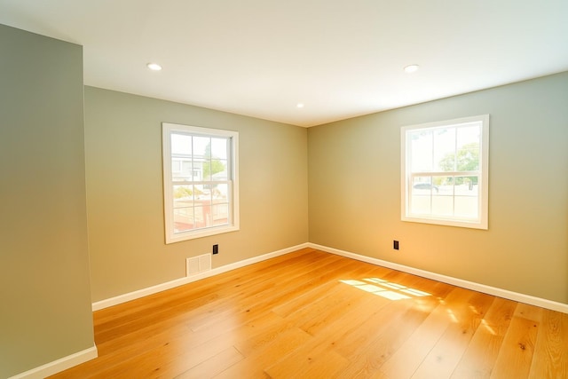 280 Neptune Ave, West Babylon, NY 11704 - unfurnished room with light wood-type flooring and recessed lighting