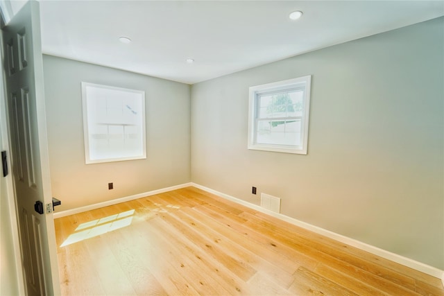 280 Neptune Ave, West Babylon, NY 11704 - unfurnished room featuring light wood finished floors and recessed lighting