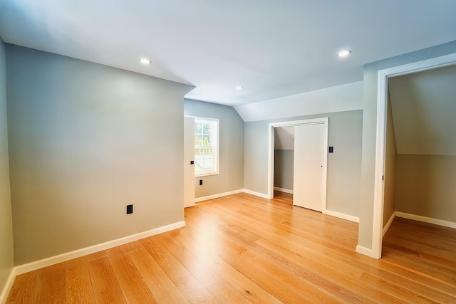 280 Neptune Ave, West Babylon, NY 11704 - interior space featuring vaulted ceiling, light wood finished floors, recessed lighting, and a closet