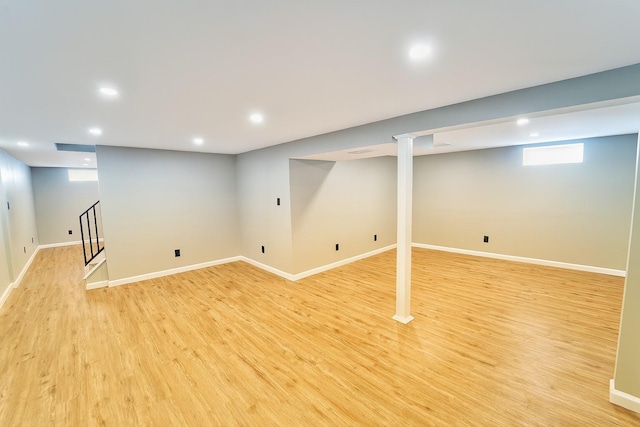 280 Neptune Ave, West Babylon, NY 11704 - basement with recessed lighting, light wood-style flooring, and stairs