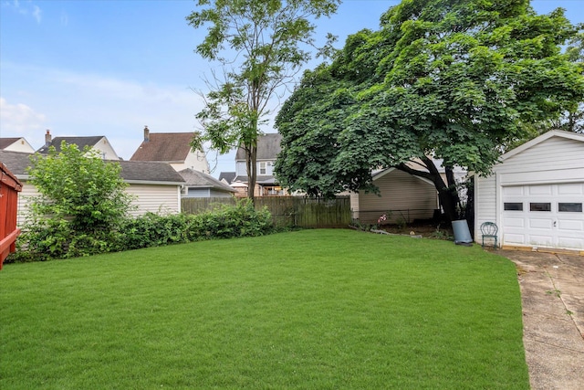 48 Carstairs Rd, Valley Stream, NY 11581 - view of yard featuring driveway and an outdoor structure