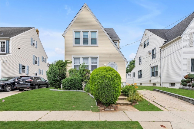 48 Carstairs Rd, Valley Stream, NY 11581 - view of front of property with a front lawn