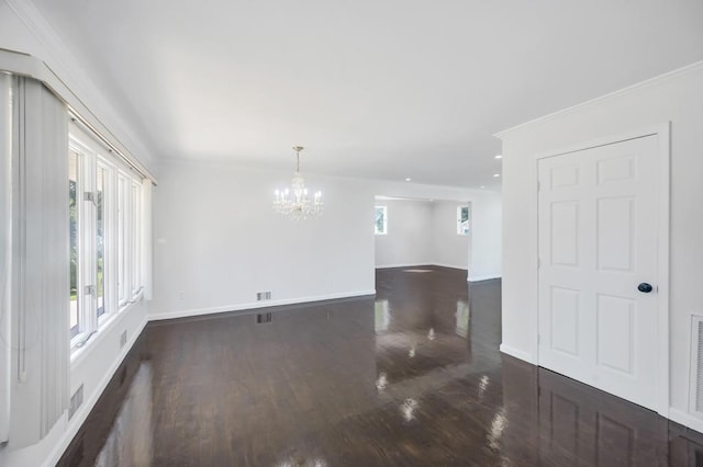 32 Clarkson Rd, Centereach, NY 11720 - unfurnished room with wood finished floors, a chandelier, healthy amount of natural light, and recessed lighting