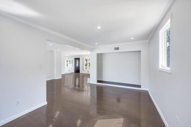 32 Clarkson Rd, Centereach, NY 11720 - spare room with wood finished floors, ornamental molding, and recessed lighting