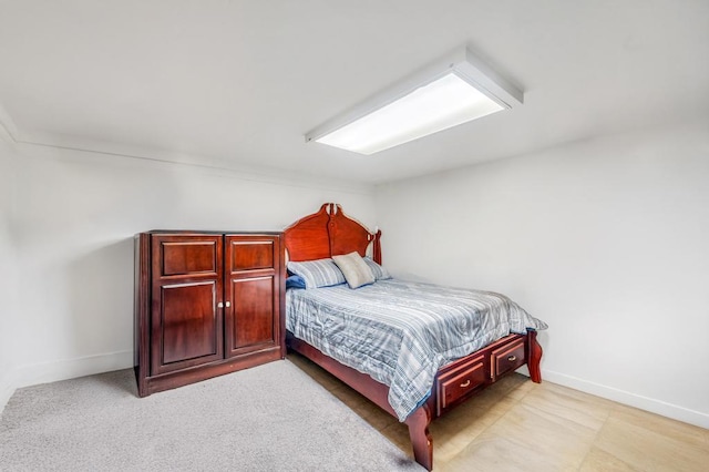 32 Clarkson Rd, Centereach, NY 11720 - bedroom featuring baseboards