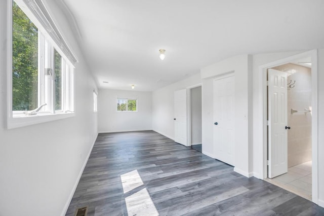 32 Clarkson Rd, Centereach, NY 11720 - unfurnished room featuring wood finished floors