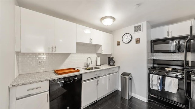 1020 Warburton Ave Unit 9C, Yonkers, NY 10701 - kitchen featuring black appliances, decorative backsplash, white cabinetry, and light stone countertops