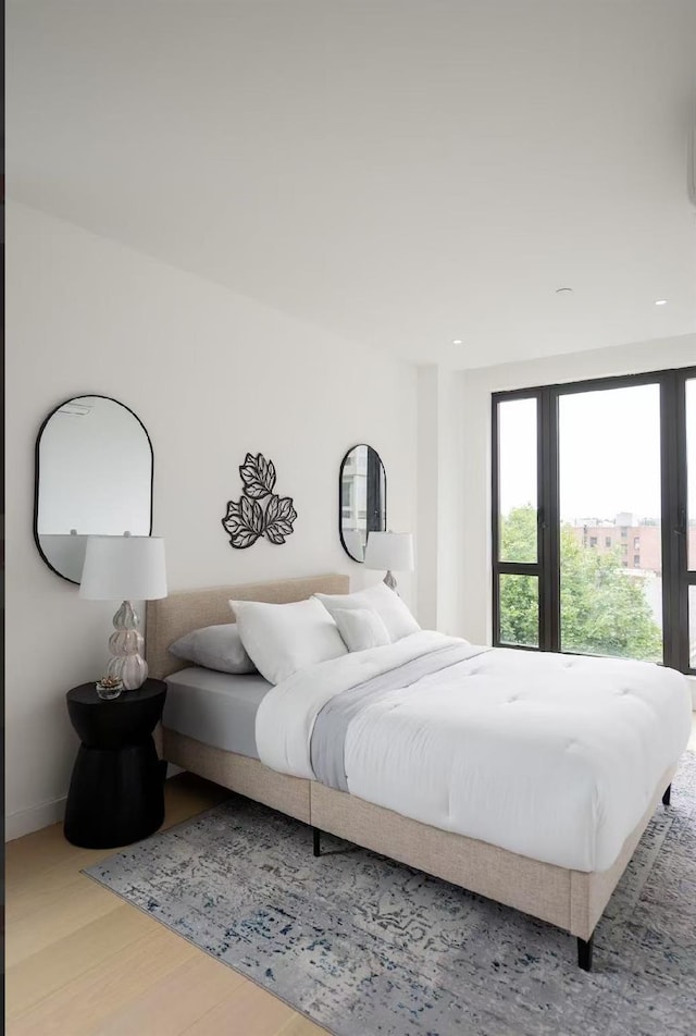 108-15 72nd Ave Unit 2C, Forest Hills, NY 11375 - bedroom featuring wood finished floors and recessed lighting