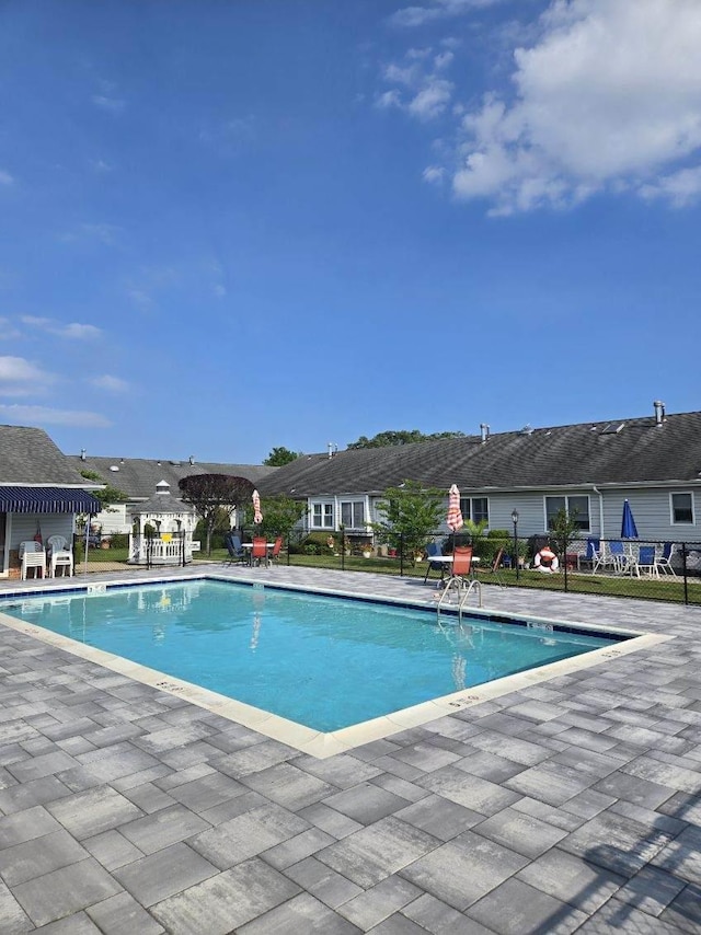 5 Primrose Ln, North Babylon, NY 11703 - community pool with a patio