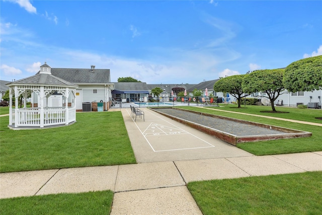 5 Primrose Ln, North Babylon, NY 11703 - view of property's community with shuffleboard, a lawn, a gazebo, and a bocce ball area