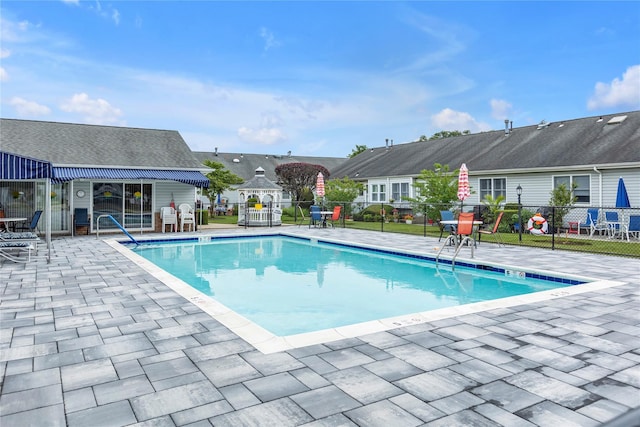 5 Primrose Ln, North Babylon, NY 11703 - community pool with a patio area