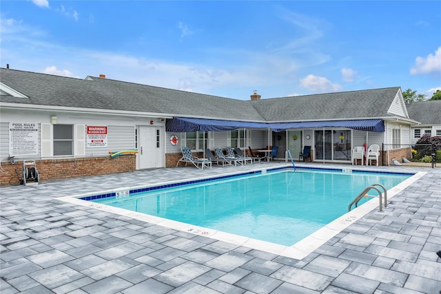 5 Primrose Ln, North Babylon, NY 11703 - community pool with a patio