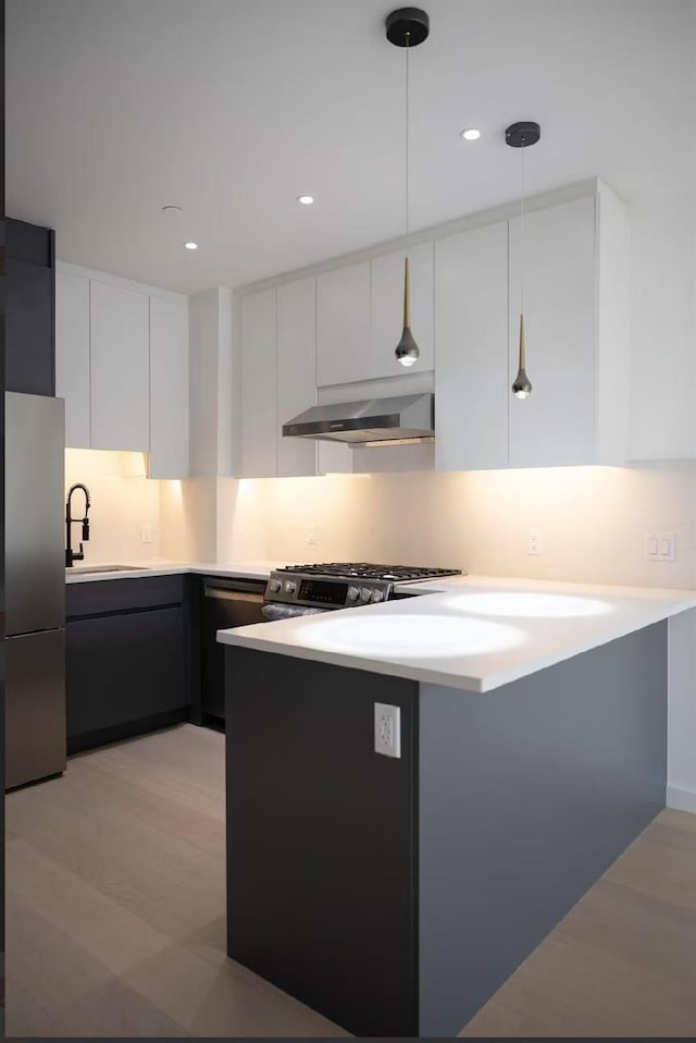 108-15 72nd Ave Unit 6A, Forest Hills, NY 11375 - kitchen featuring ventilation hood, modern cabinets, light countertops, white cabinets, and recessed lighting