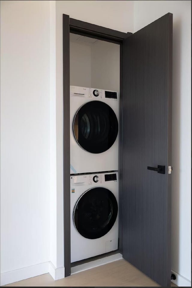 108-15 72nd Ave Unit 6A, Forest Hills, NY 11375 - laundry room featuring estacked washer and dryer