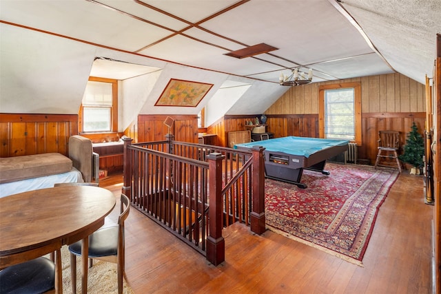 353 W Elm Rd, Mastic Beach, NY 11951 - game room with wood walls, vaulted ceiling, hardwood / wood-style flooring, and pool table