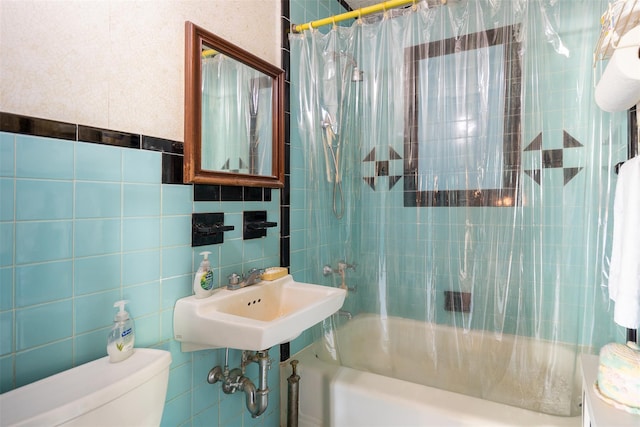 353 W Elm Rd, Mastic Beach, NY 11951 - bathroom featuring shower / bath combo and tile walls