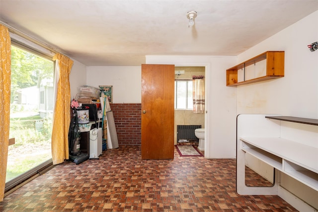 353 W Elm Rd, Mastic Beach, NY 11951 - interior space with radiator heating unit