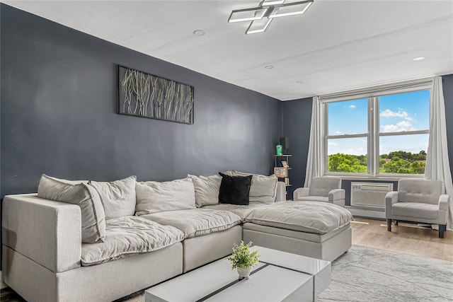 5444 Little Neck Pkwy Unit 6C, Little Neck, NY 11362 - living area featuring wood finished floors, baseboard heating, recessed lighting, and a wall unit AC
