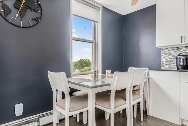 5444 Little Neck Pkwy Unit 6C, Little Neck, NY 11362 - dining room with plenty of natural light, tile patterned floors, and a baseboard radiator