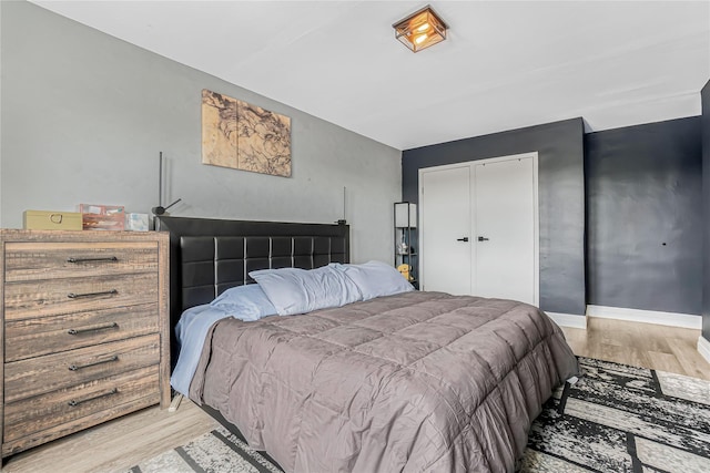 5444 Little Neck Pkwy Unit 6C, Little Neck, NY 11362 - bedroom with light wood-type flooring and a closet