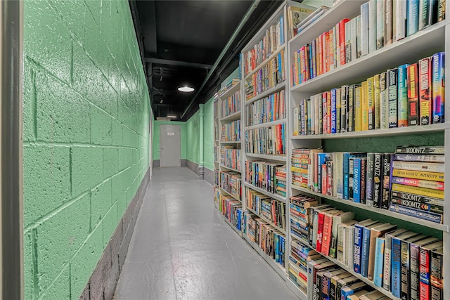 5444 Little Neck Pkwy Unit 6C, Little Neck, NY 11362 - corridor with concrete floors and concrete block wall