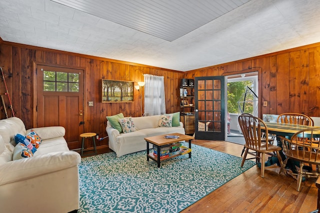 1467 Rte 292, Holmes, NY 12531 - living room with plenty of natural light, hardwood / wood-style floors, and wood walls