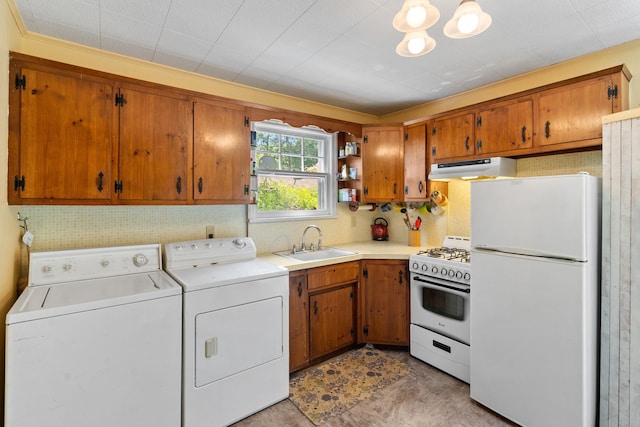 1467 Rte 292, Holmes, NY 12531 - kitchen featuring white appliances, washer and dryer, light countertops, and brown cabinetry
