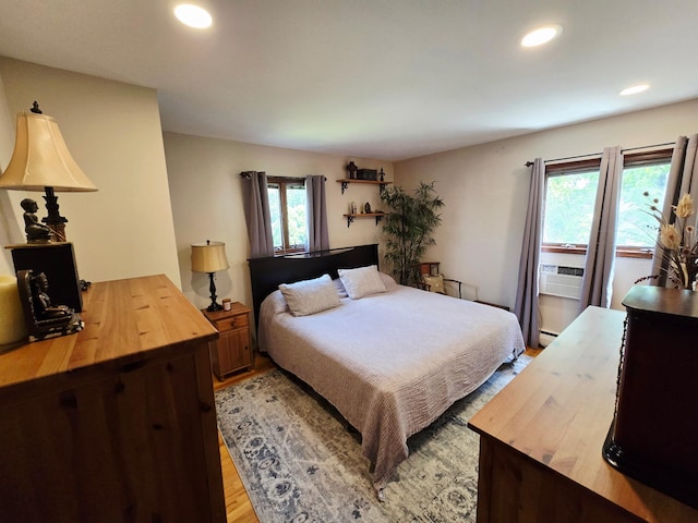 356 Montgomery Ave, West Babylon, NY 11704 - bedroom with light wood-style flooring and recessed lighting
