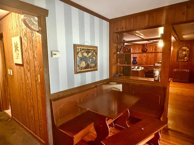 1183 State Route 94, New Windsor, NY 12553 - dining space with wallpapered walls, wooden walls, and wood finished floors
