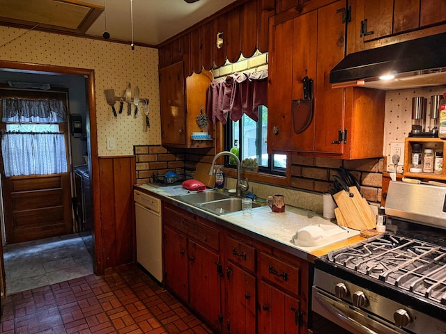 1183 State Route 94, New Windsor, NY 12553 - kitchen featuring stainless steel gas range oven, under cabinet range hood, dishwasher, wainscoting, and brick patterned flooring