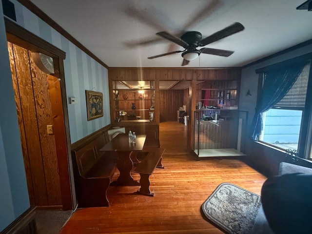 1183 State Route 94, New Windsor, NY 12553 - sitting room featuring a ceiling fan, crown molding, wood finished floors, and wood walls