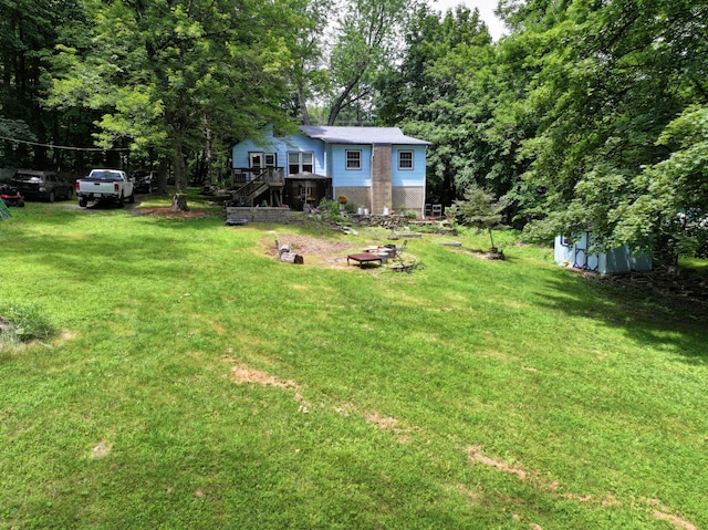 1183 State Route 94, New Windsor, NY 12553 - view of green lawn with stairway and a wooden deck