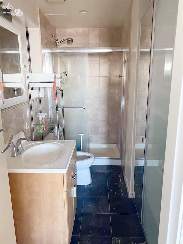 3138 137th St Unit 5A, Flushing, NY 11354 - bathroom with vanity, a stall shower, tile patterned flooring, and tile walls