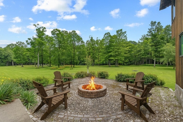 10 May Knl, Dover Plains, NY 12522 - view of patio / terrace with an outdoor fire pit and view of wooded area