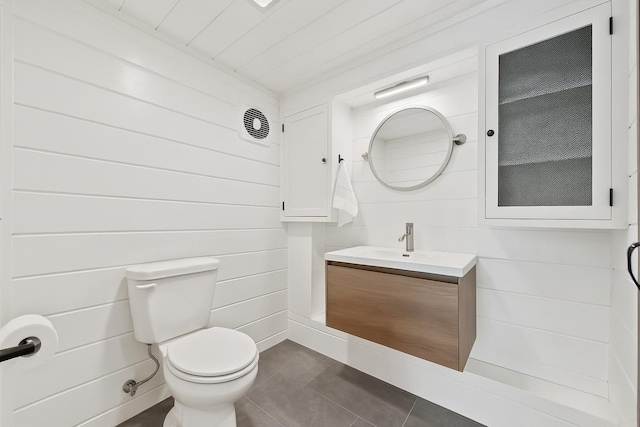 10 May Knl, Dover Plains, NY 12522 - bathroom with vanity, tile patterned flooring, and wooden walls