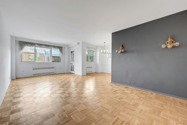 3530 Henry Hudson Pkwy Unit 1B, Bronx, NY 10463 - unfurnished room with radiator, a chandelier, and cooling unit