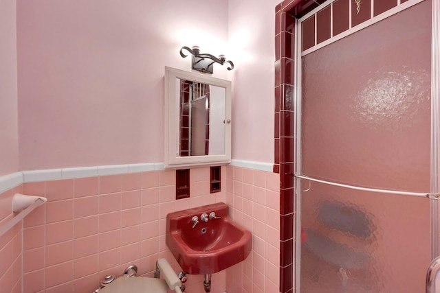 3530 Henry Hudson Pkwy Unit 1B, Bronx, NY 10463 - full bath featuring a shower stall, wainscoting, and tile walls
