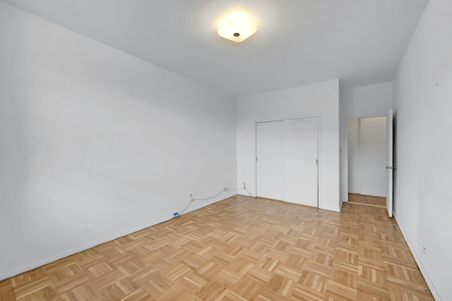 3530 Henry Hudson Pkwy Unit 1B, Bronx, NY 10463 - unfurnished bedroom featuring a closet and baseboards