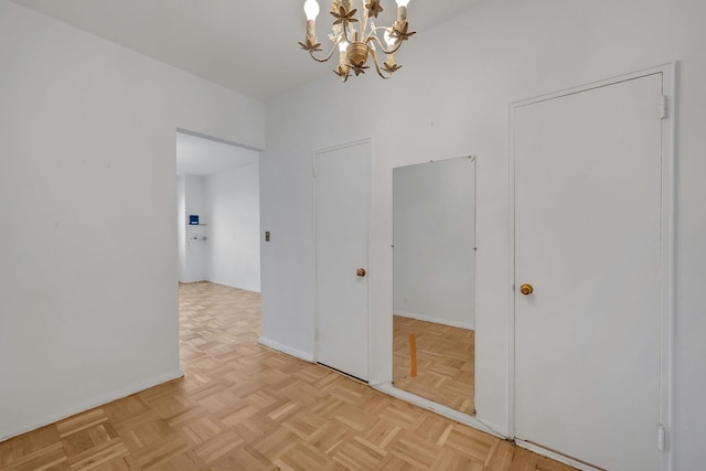 3530 Henry Hudson Pkwy Unit 1B, Bronx, NY 10463 - empty room with a chandelier and baseboards