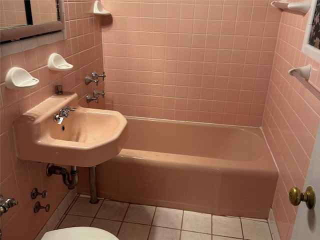 3530 Henry Hudson Pkwy Unit 1B, Bronx, NY 10463 - bathroom featuring tile patterned flooring,  shower combination, and tile walls