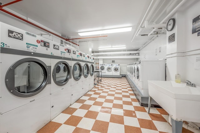 3530 Henry Hudson Pkwy Unit 1B, Bronx, NY 10463 - community laundry room with washing machine and clothes dryer and light floors