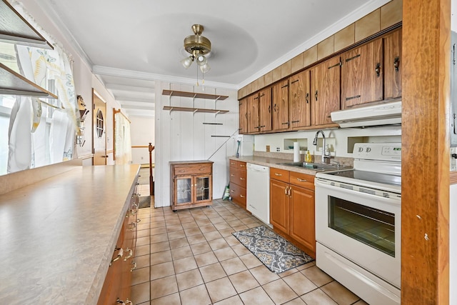 129 Spring Ln, Levittown, NY 11756 - kitchen with white appliances, under cabinet range hood, ornamental molding, ceiling fan, and brown cabinets