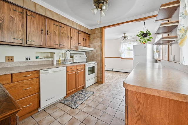129 Spring Ln, Levittown, NY 11756 - kitchen featuring white appliances, a ceiling fan, under cabinet range hood, brown cabinets, and light tile patterned floors