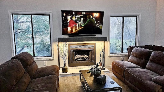 6 Devon Ct, Nanuet, NY 10954 - living room with wood finished floors and a fireplace with raised hearth
