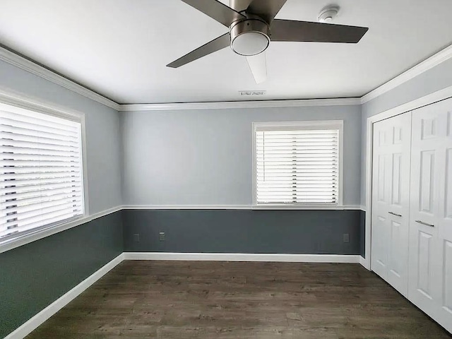 6 Devon Ct, Nanuet, NY 10954 - unfurnished bedroom featuring crown molding, dark wood-style flooring, a closet, and a ceiling fan