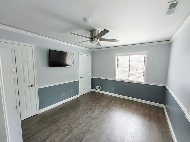 6 Devon Ct, Nanuet, NY 10954 - unfurnished bedroom featuring dark wood finished floors, ornamental molding, and a ceiling fan