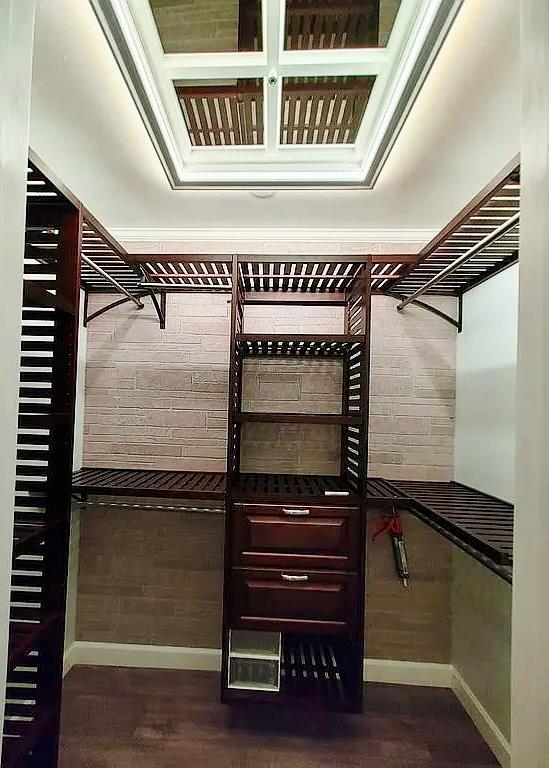 6 Devon Ct, Nanuet, NY 10954 - spacious closet with dark wood finished floors